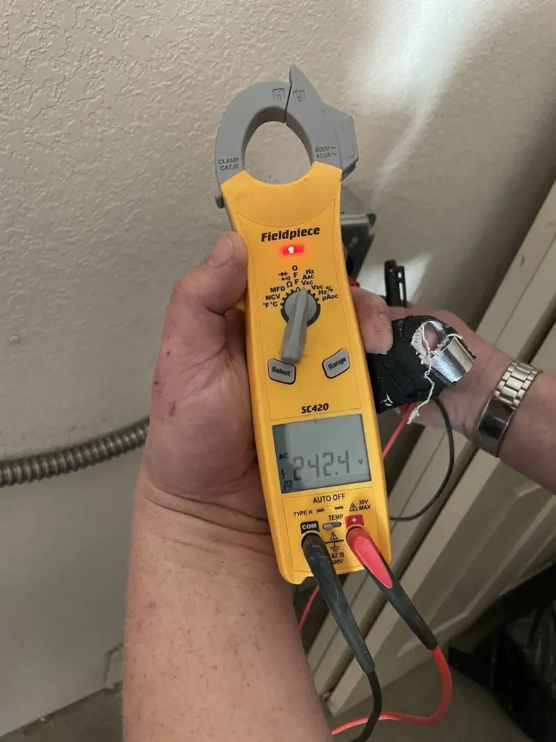 Voltage testing with clamp meter during Generator Installation in Kingsburg